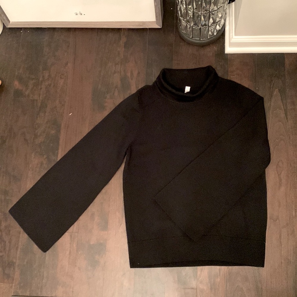 NWOT Lululemon funnel neck sweater in black soft merino wool. Perfect condition